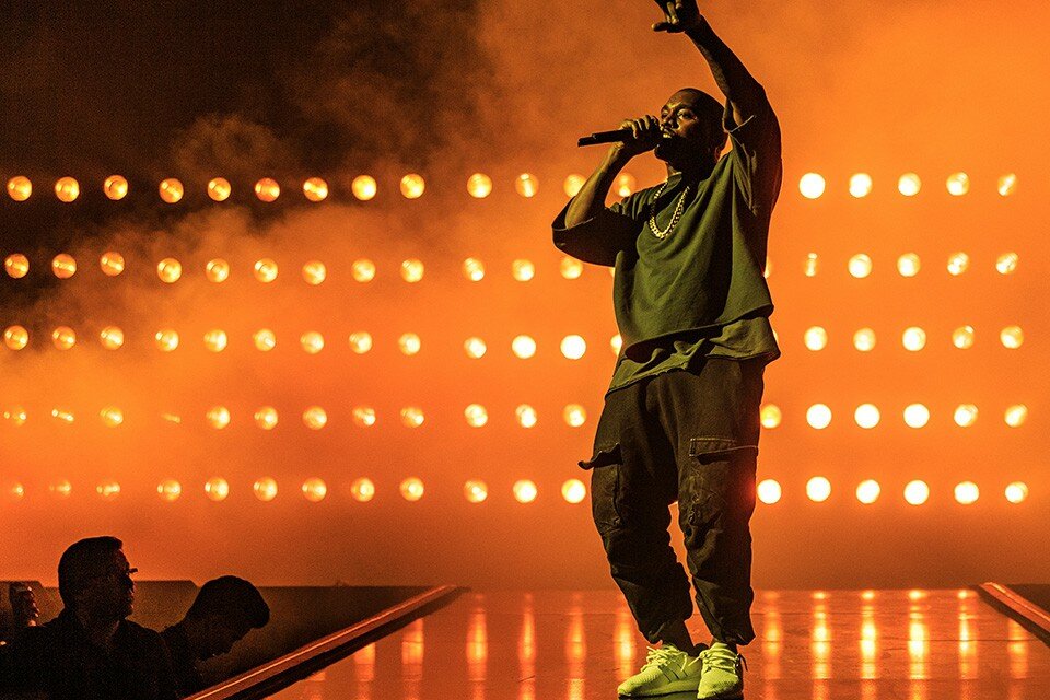 Kanye West, one of modern hip-hops most influential and controversial stars performs at a Drake Concert (Photo via. Highsnobiety)